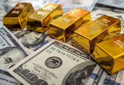الذهب يرتفع بعد رسوم ترامب الجمركية الجديدة وقوة الدولار تحد من المكاسب